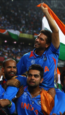 Sachin Tendulkar and Virat Kohli in World Cup 2011 winning celebration