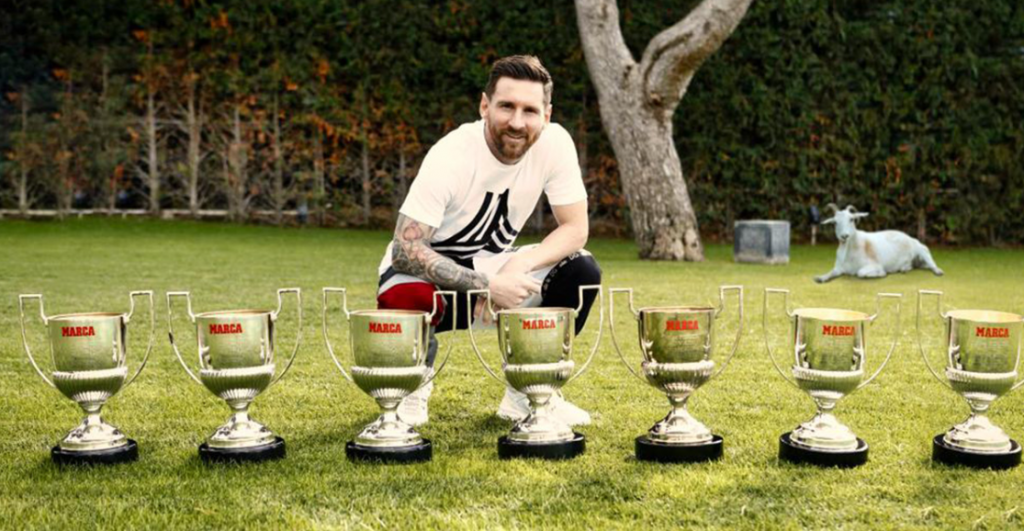 Messi with his seven Pichichi Trophies