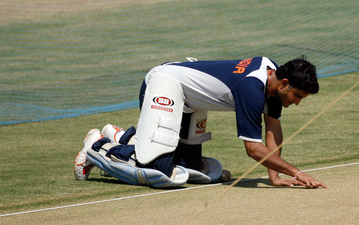 Ganguly examines the playing pitch